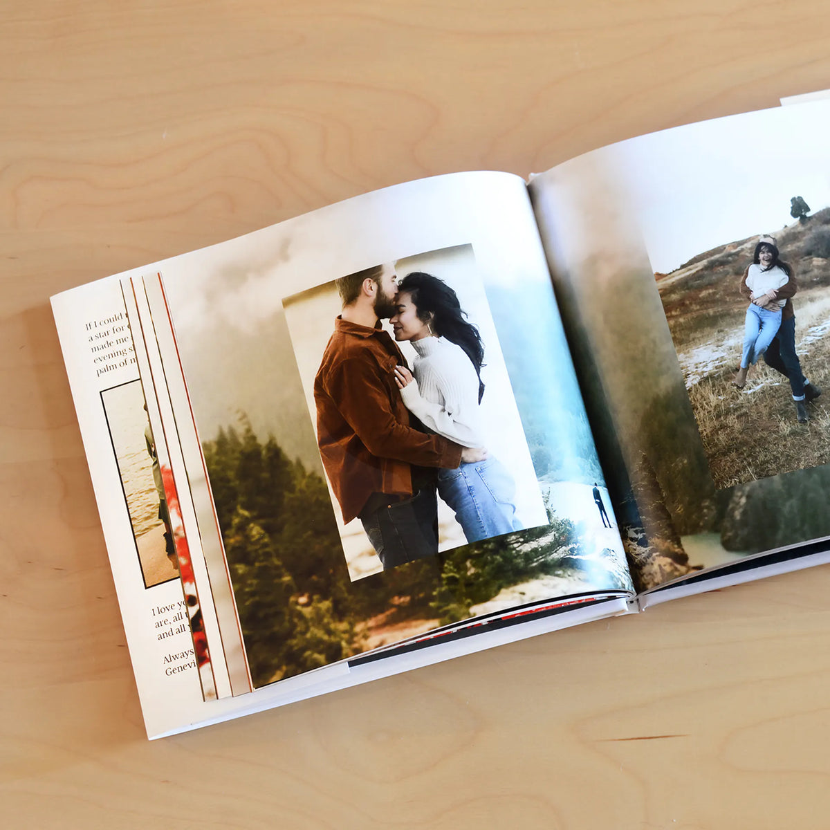Hardcover photo book open to layered couple photos alongside a handwritten-style love letter page signed 'Genevieve.'