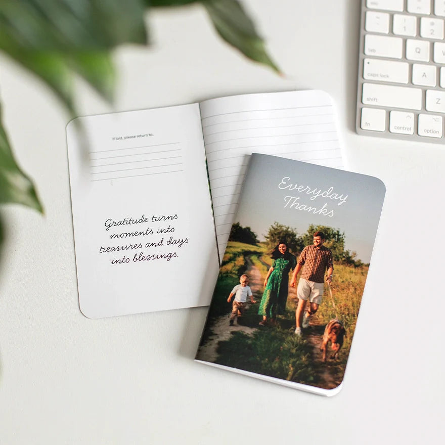 Memo book with a custom photo cover reading “Everyday Thanks,” shown open with a printed quote inside.