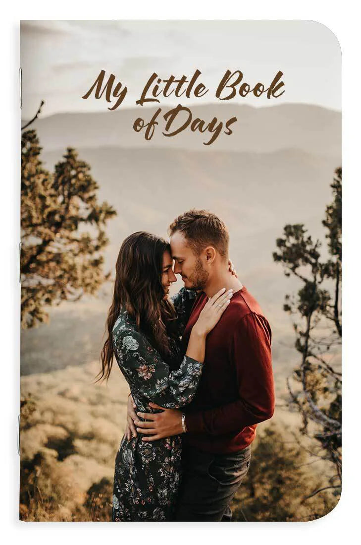 Memo book titled 'My Little Book of Days' with a couple embracing in nature on the cover.