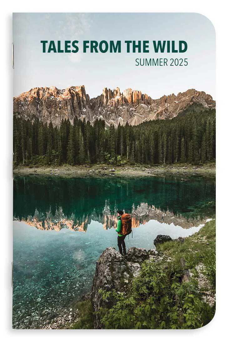 Memo book cover with a scenic view of a lake and mountains, featuring 'Tales from the Wild Summer 2025' text.