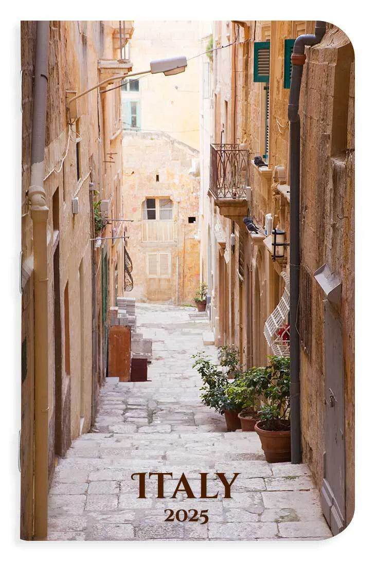 Memo book cover with a narrow street in Italy and 'Italy 2025' text.