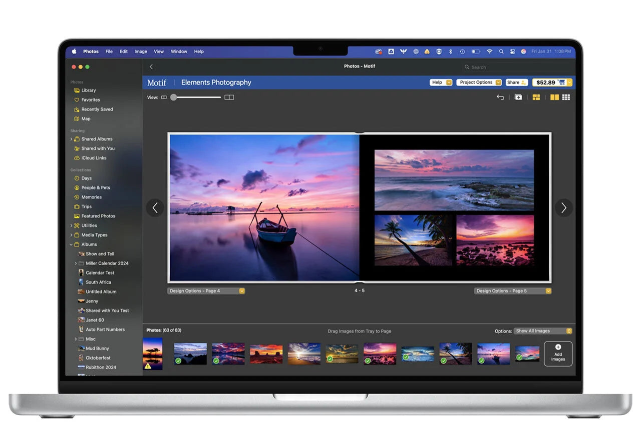 Laptop screen showing a photo book design program with a sunset landscape spread and photo thumbnails along the bottom.