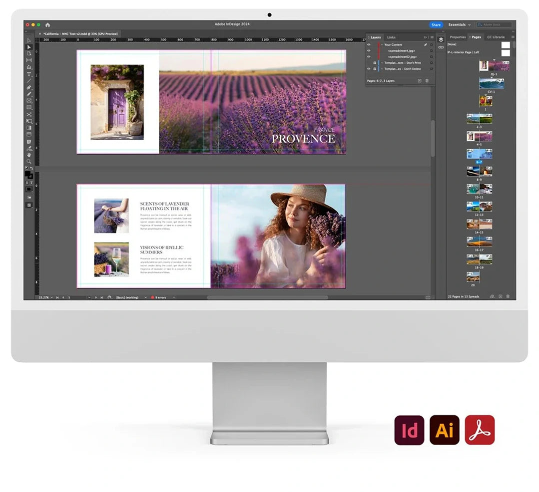 Desktop monitor displaying Adobe InDesign photo book layout featuring travel images of lavender fields with design guides and page thumbnails visible.