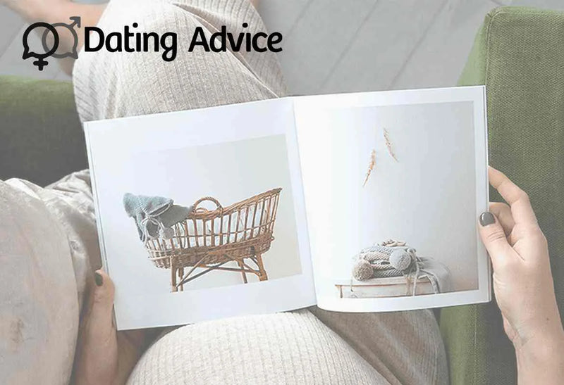 Person sitting on a couch holding an open photo book showing minimalist photos of a wicker baby bassinet and folded baby clothing, with Dating Advice logo overlay in top left corner.
