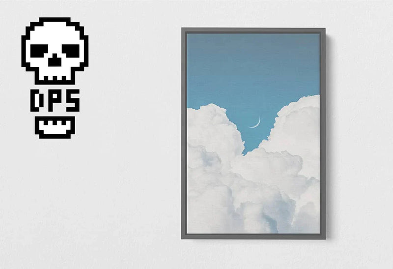 Framed minimalist artwork of white clouds with a crescent moon against a blue sky displayed on a light wall.