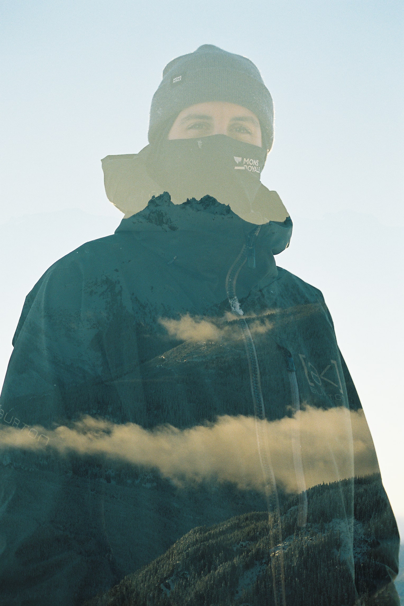 hiker with double exposure mountainscape