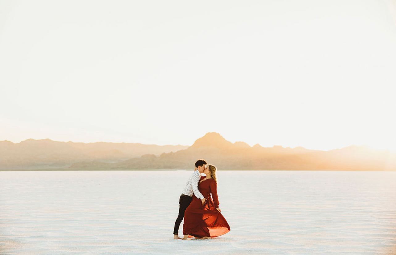 couple dipped for a kiss in remote location