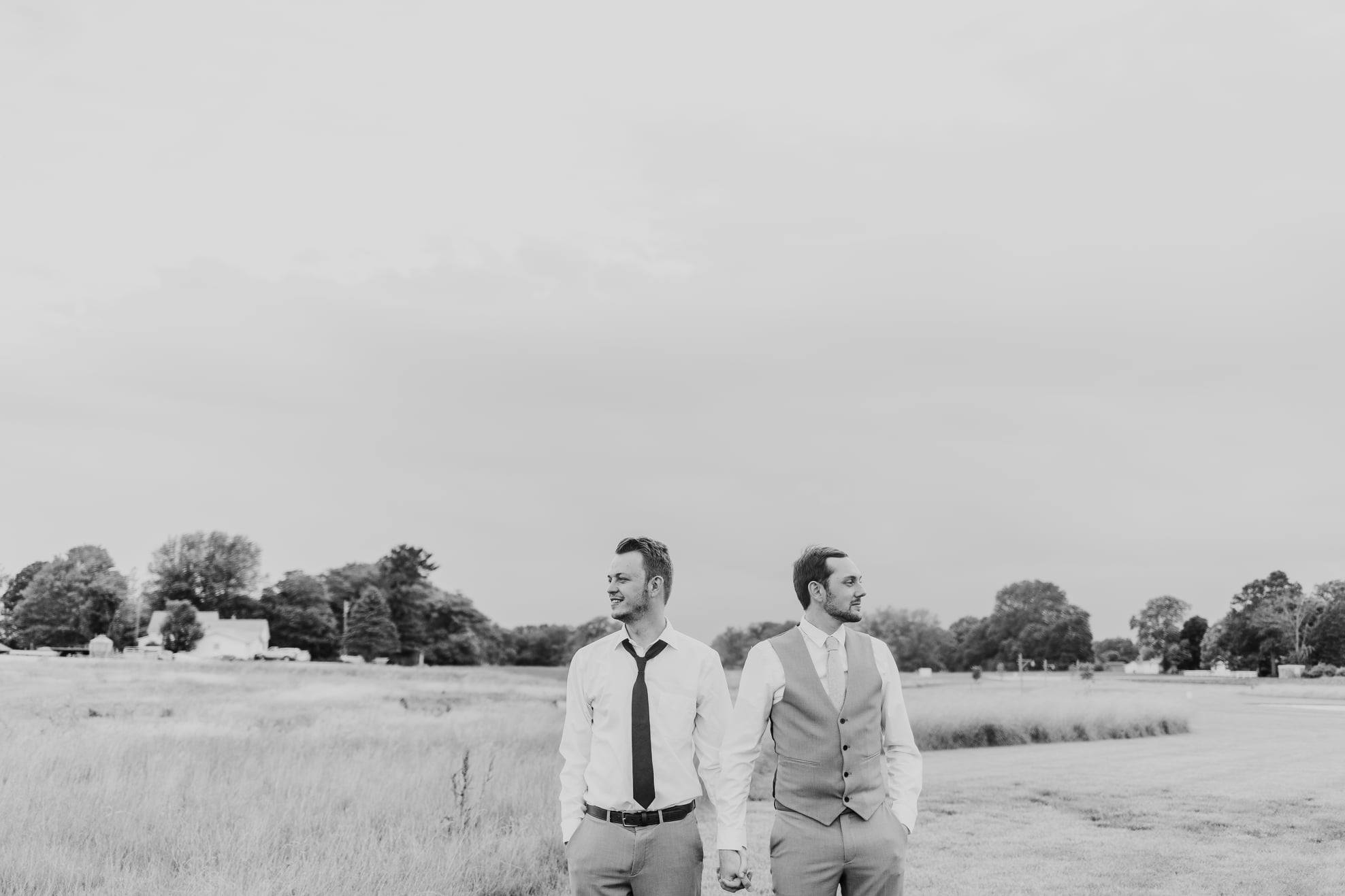black and white photo of male couple