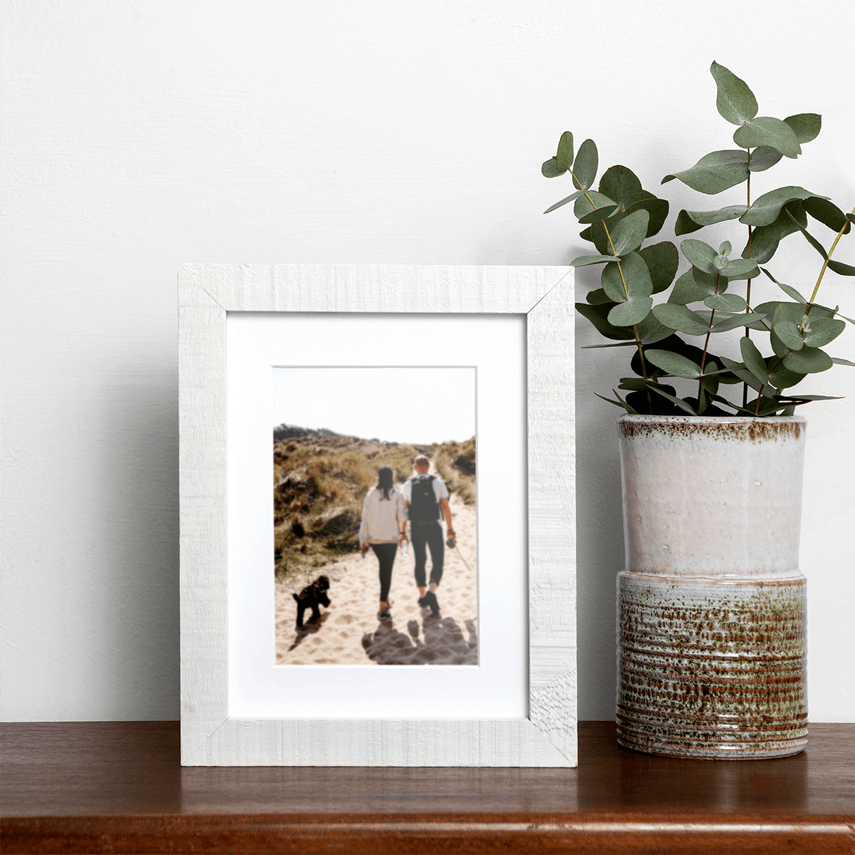 Order a set of personalized photo prints with some snapshots of Man's Best Friend