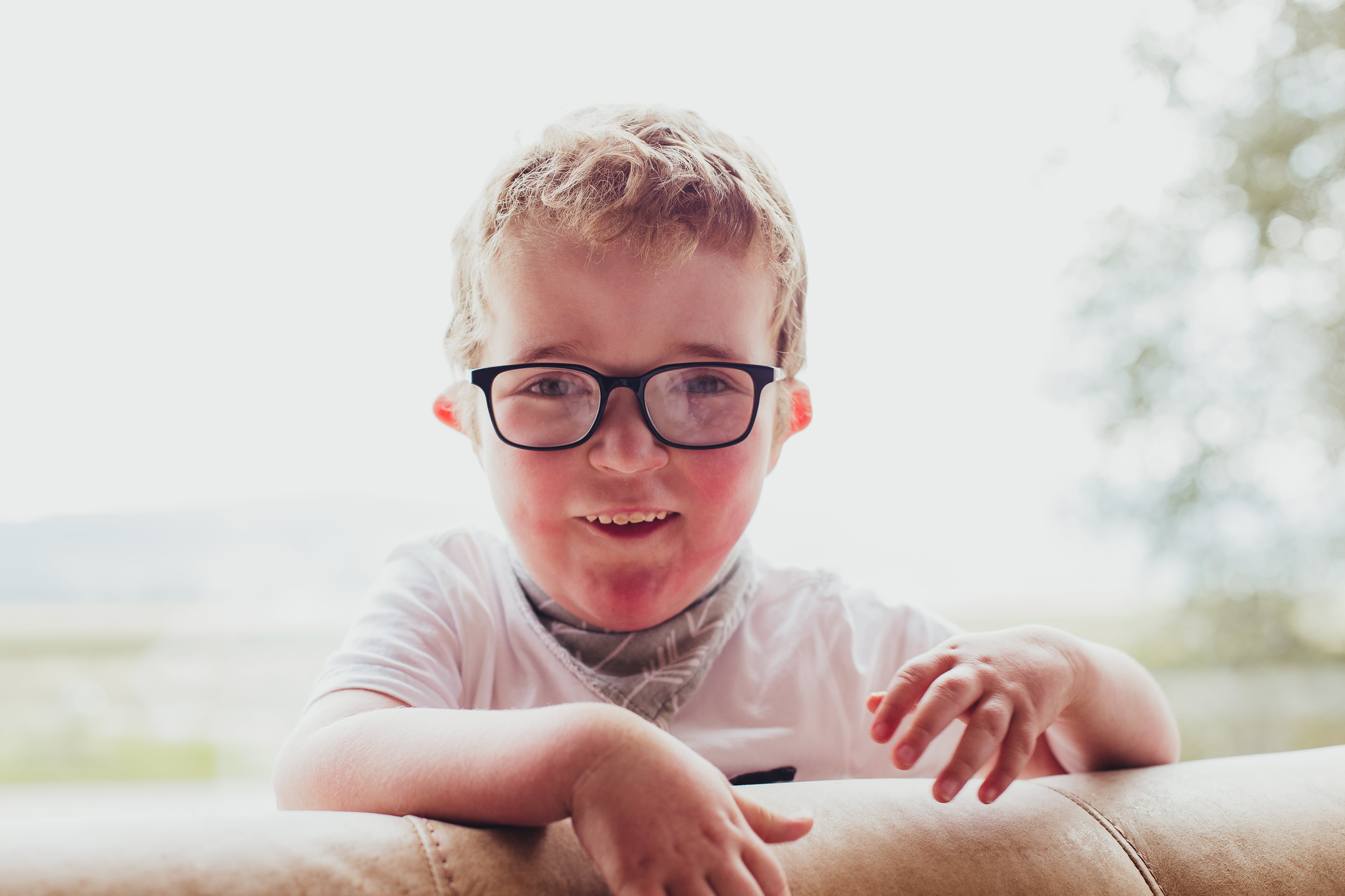 portrait of boy with glasses