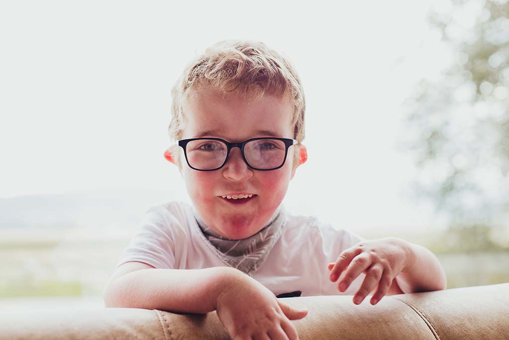 portrait of boy with glasses