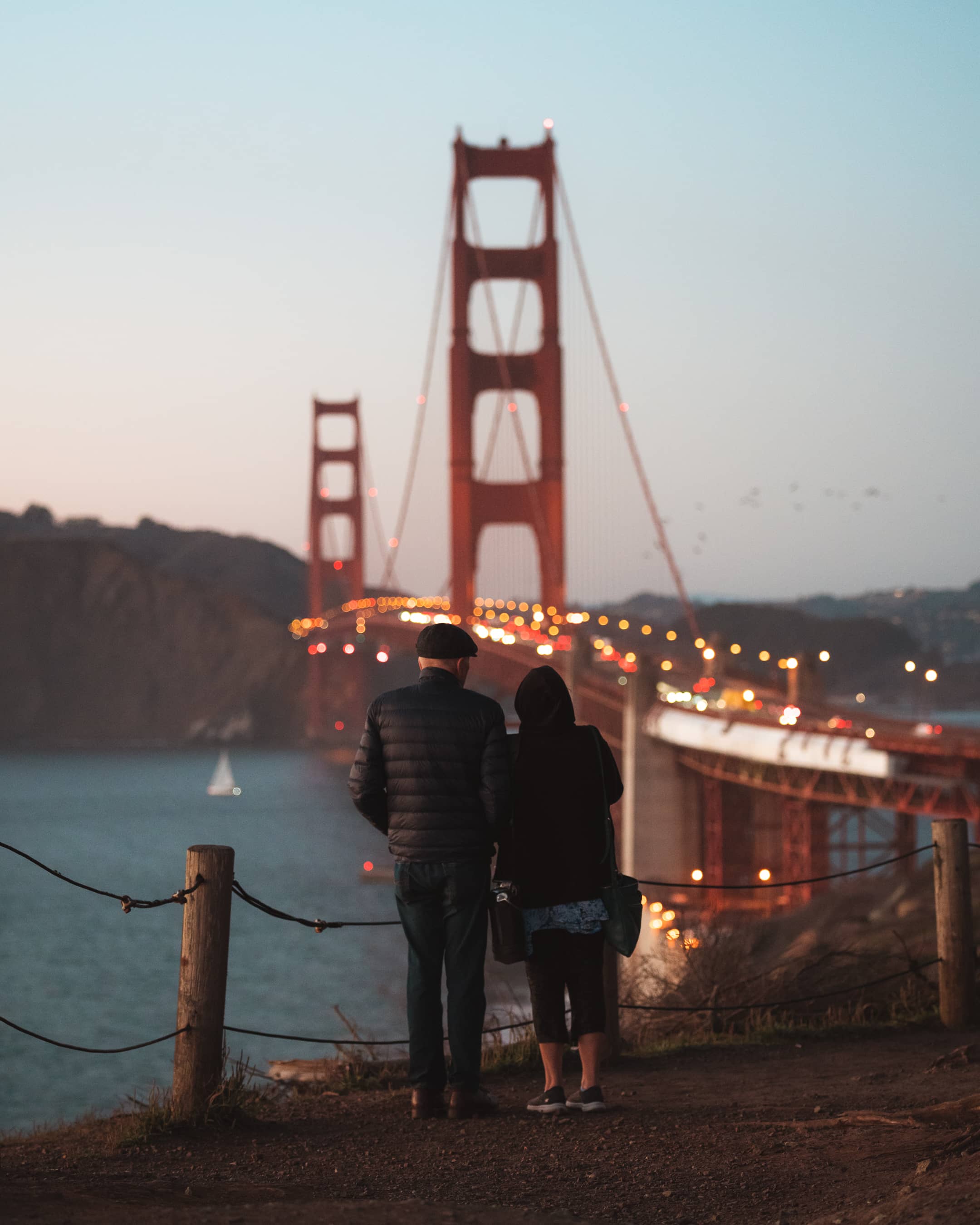 couple looking at golden gate bridge