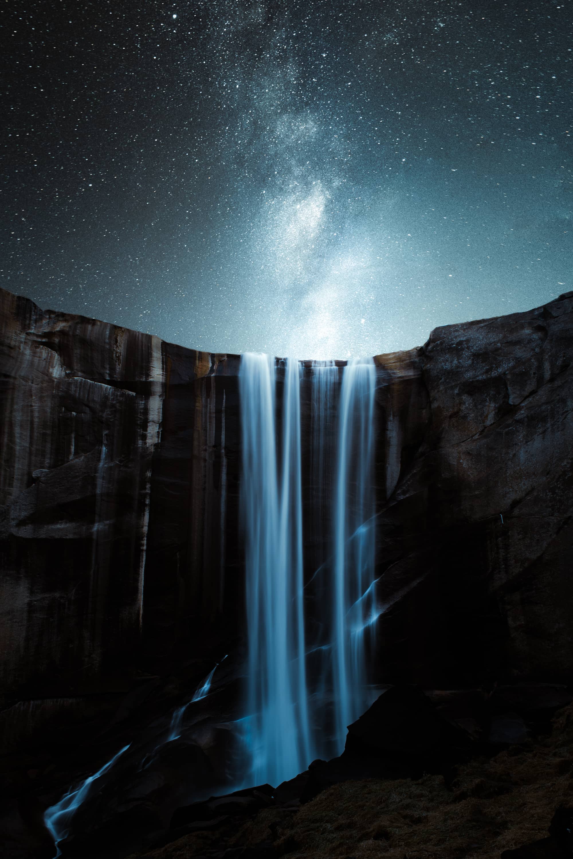 Waterfall With a Starry Night Sky by Jordan Mcgarth