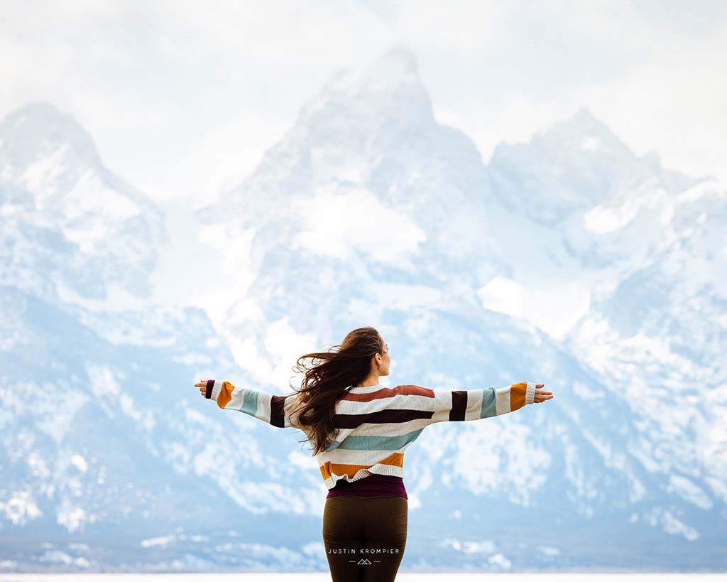 Woman standing infront of mountainscape