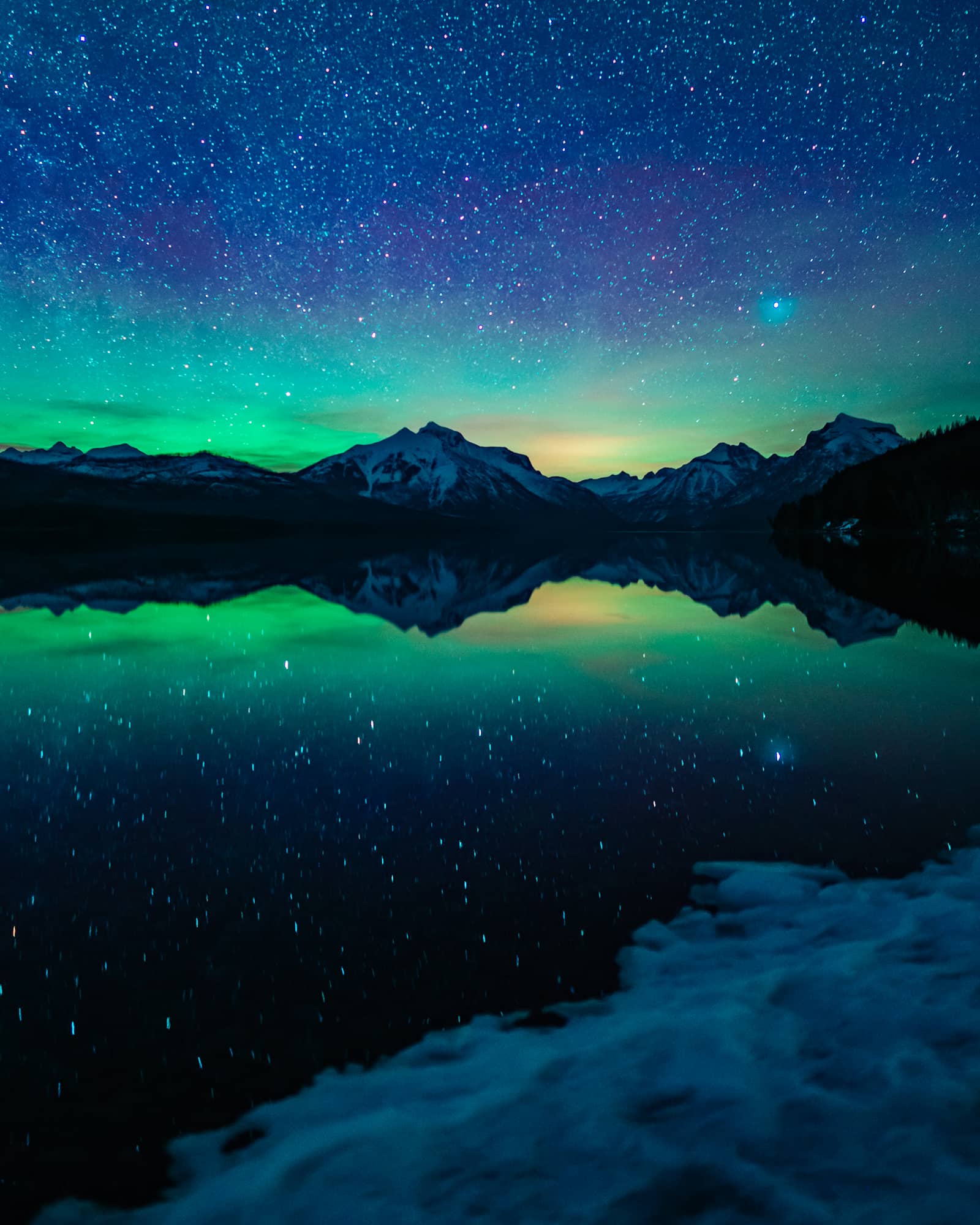 galaxy stars over mountains and lake at night
