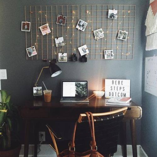 Create a whimsical look with stringlights as a creative way to display photos without frames