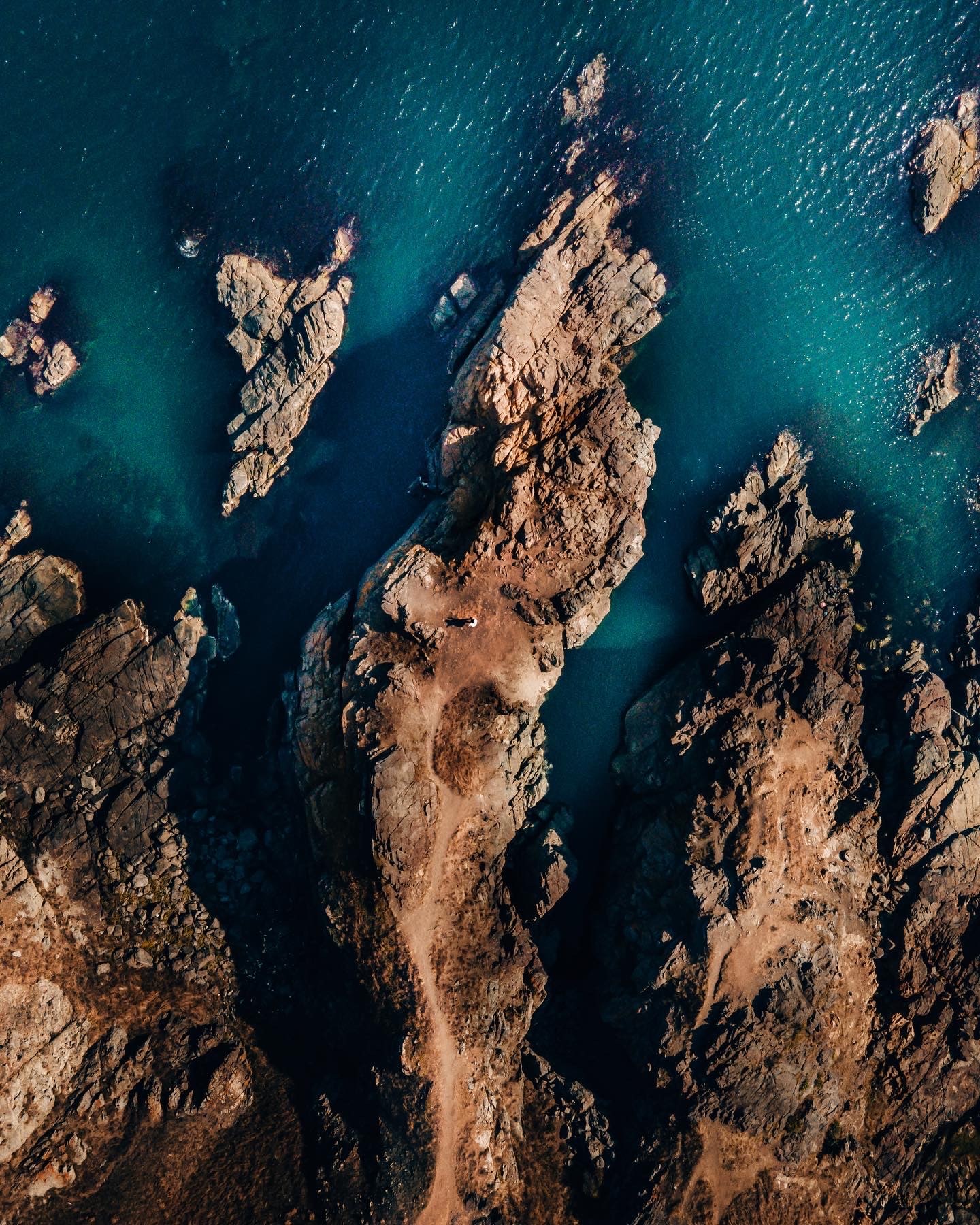 drone shot of norway rocks and the ocean