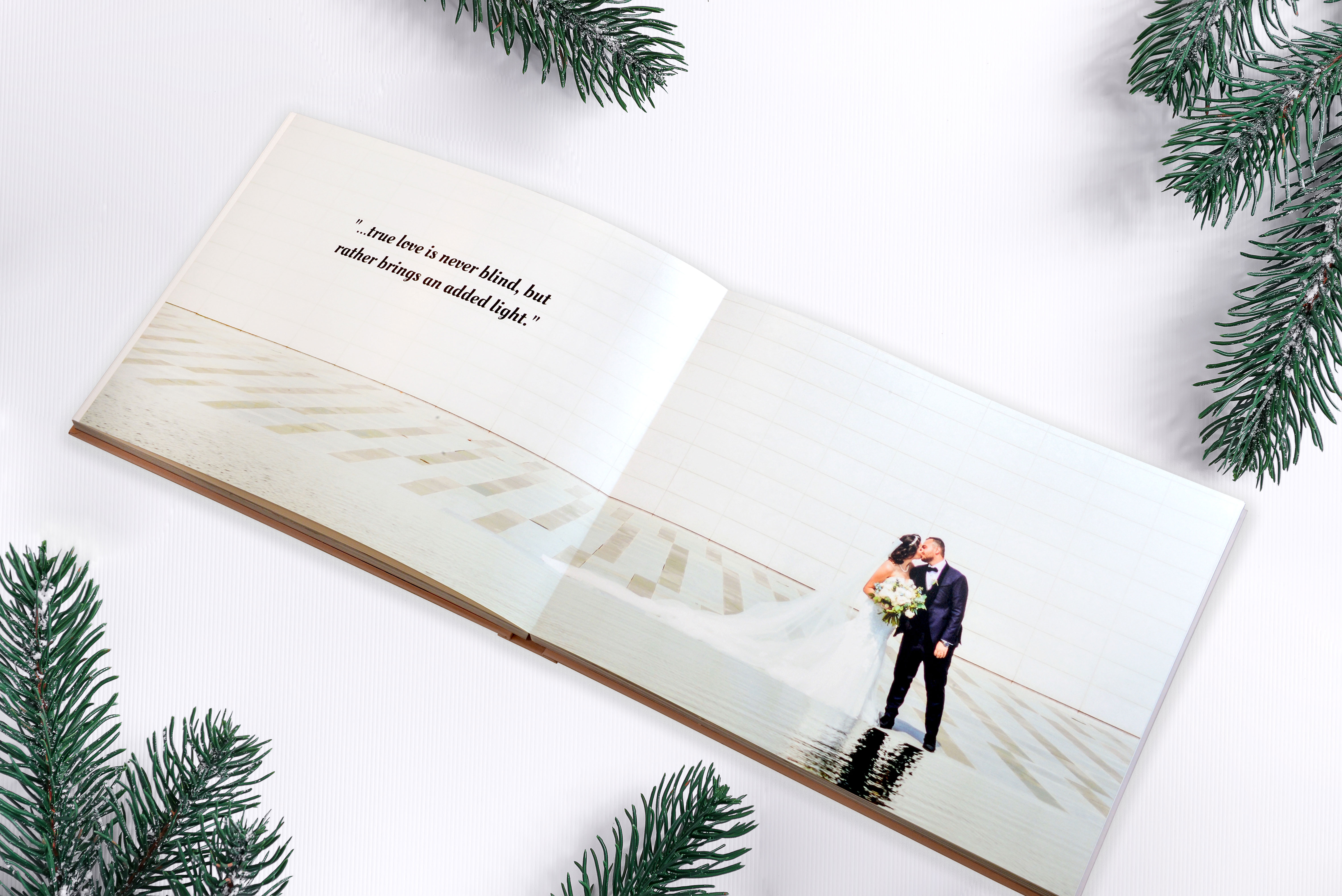 Layflat photo book showing a married couple on their wedding day