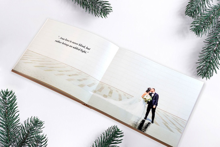 Layflat photo book showing a married couple on their wedding day