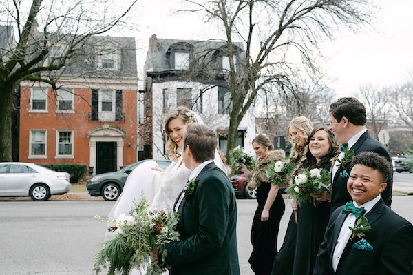 Wedding party walking in the street