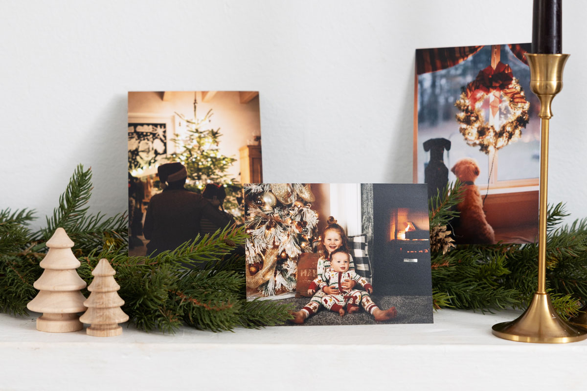 Printed photos on a Christmas mantle