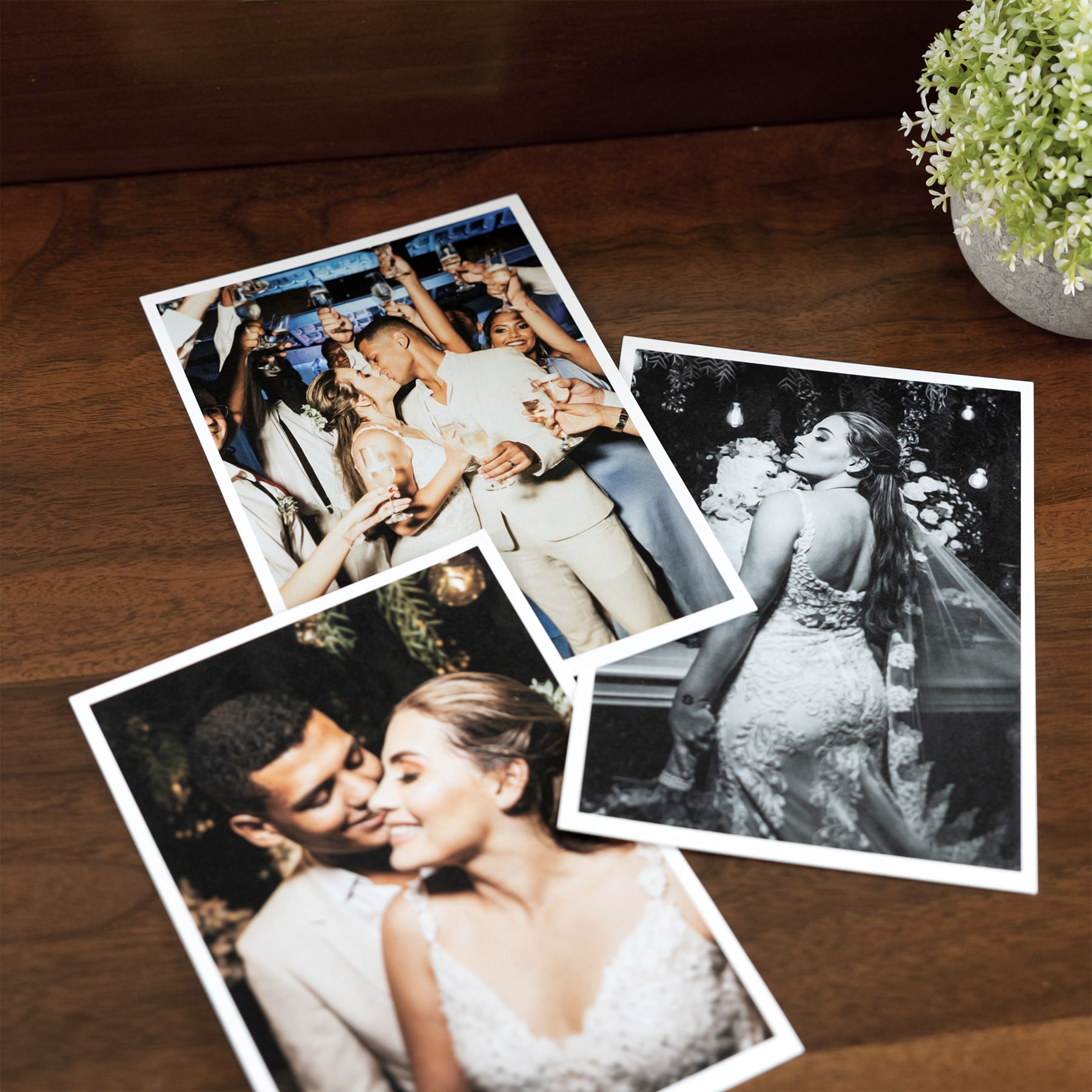 Wedding reception and party photos displayed on table