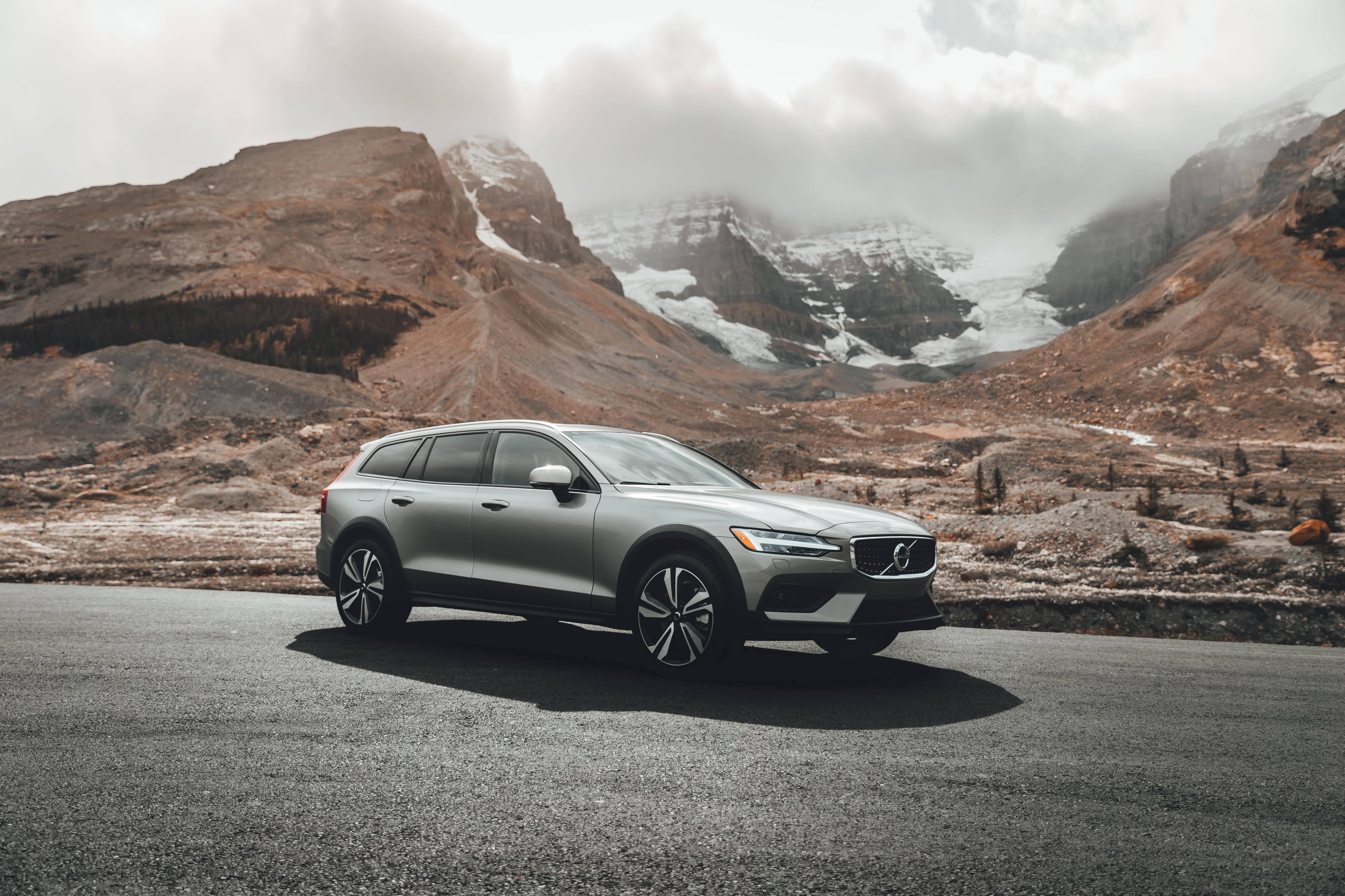 volvo car with mountain landscape