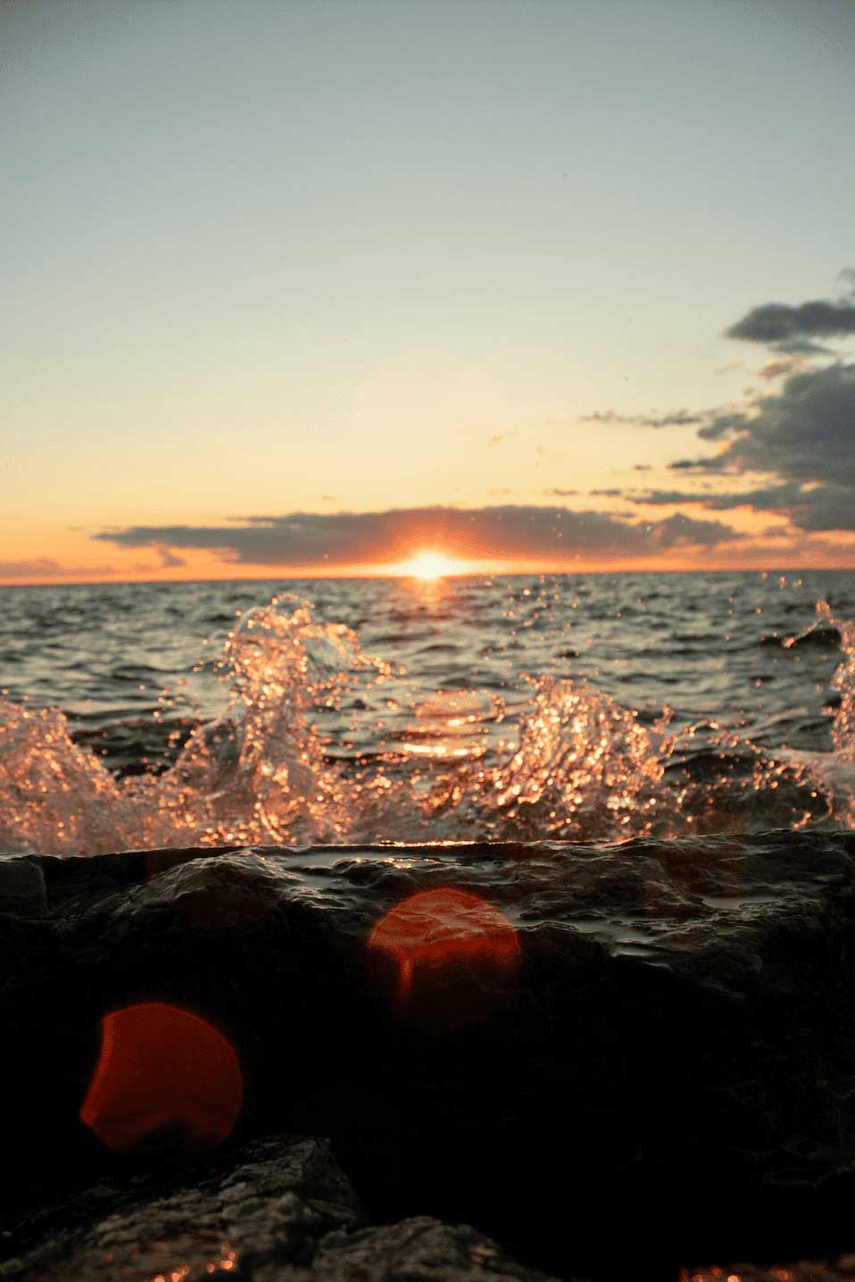  splashing on the beach with the end of sunset